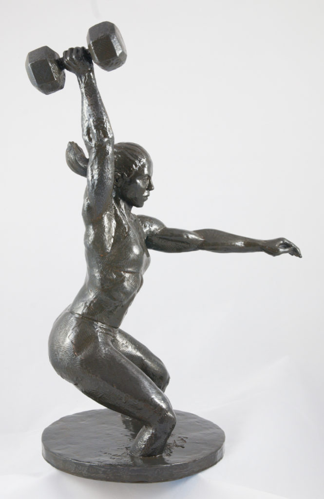 Sculpture of woman holding dumbbell