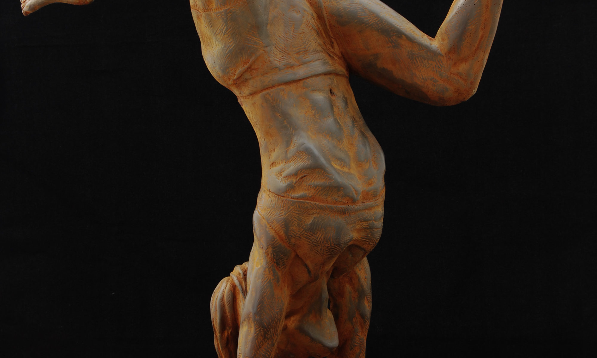 Sculpture of female athlete holding a handstand pose