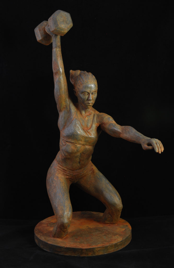 Sculpture of female CrossFit athlete performing a dumbbell snatch