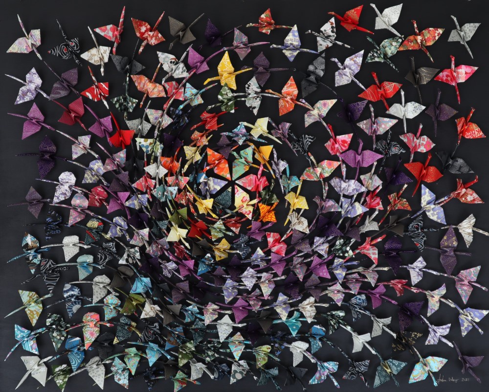 Origami artwork with origami cranes